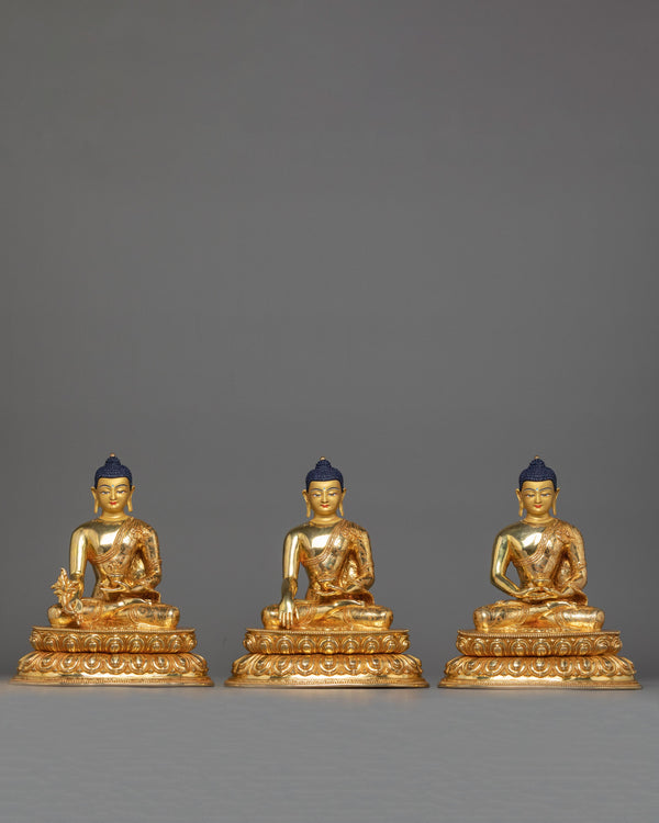 statues of three buddhas