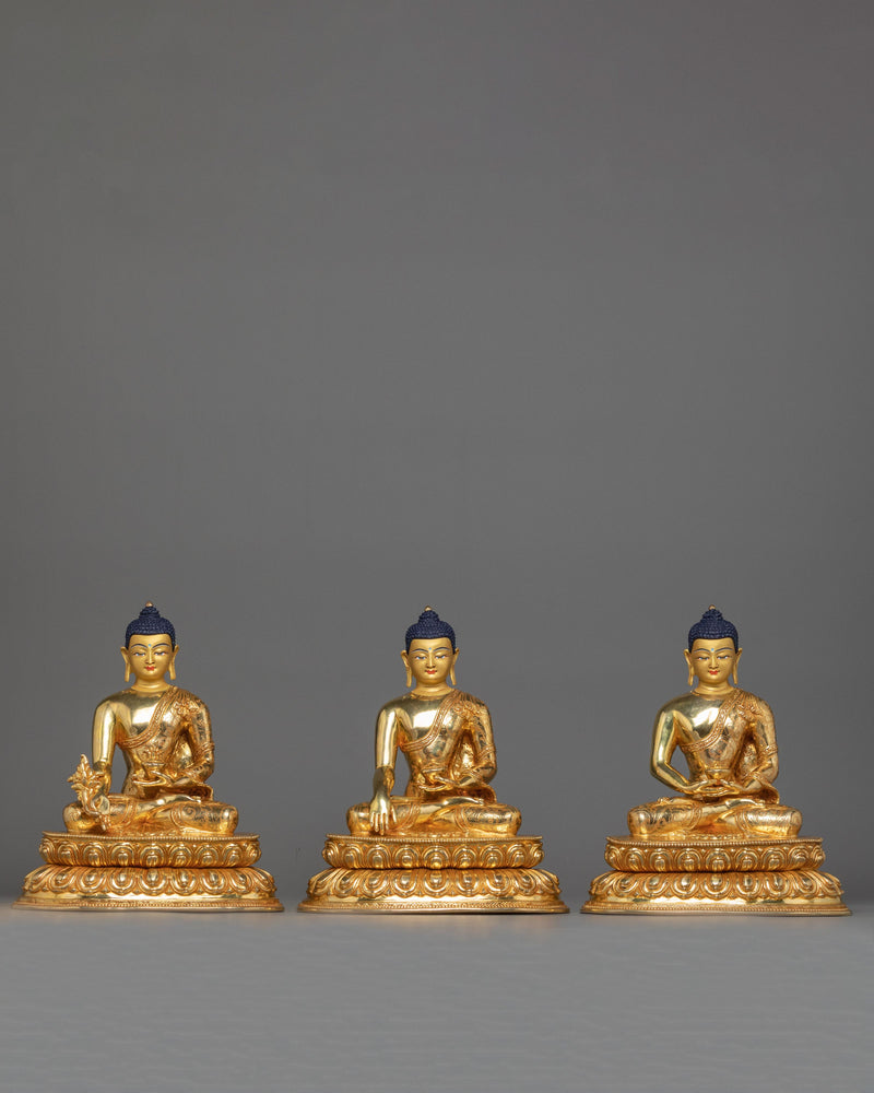 statues of three buddhas